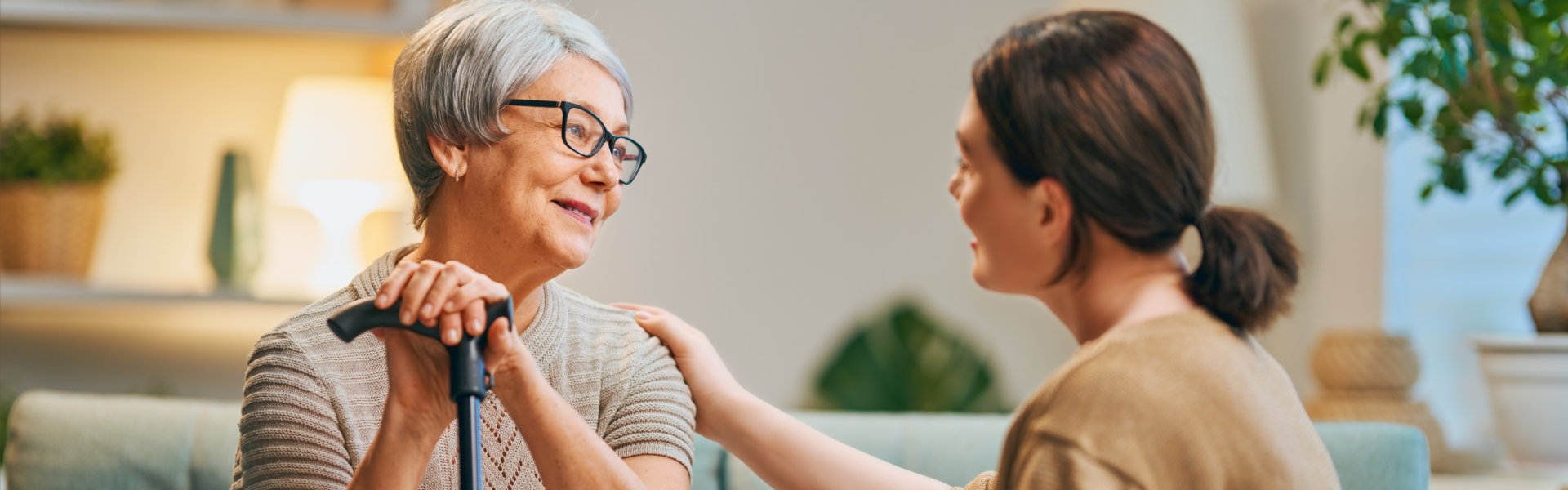 woman volunteer talking to the senior woman